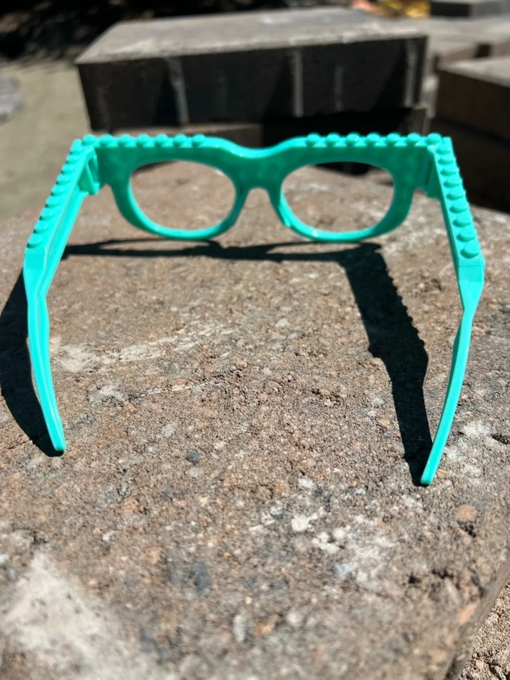 collectible teal LEGO-themed glasses 🤓